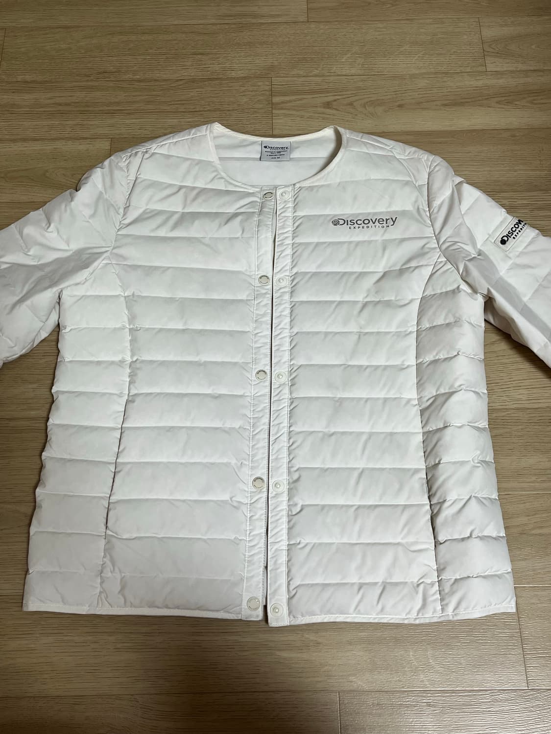 디스커버리 경량패딩 상품이미지1