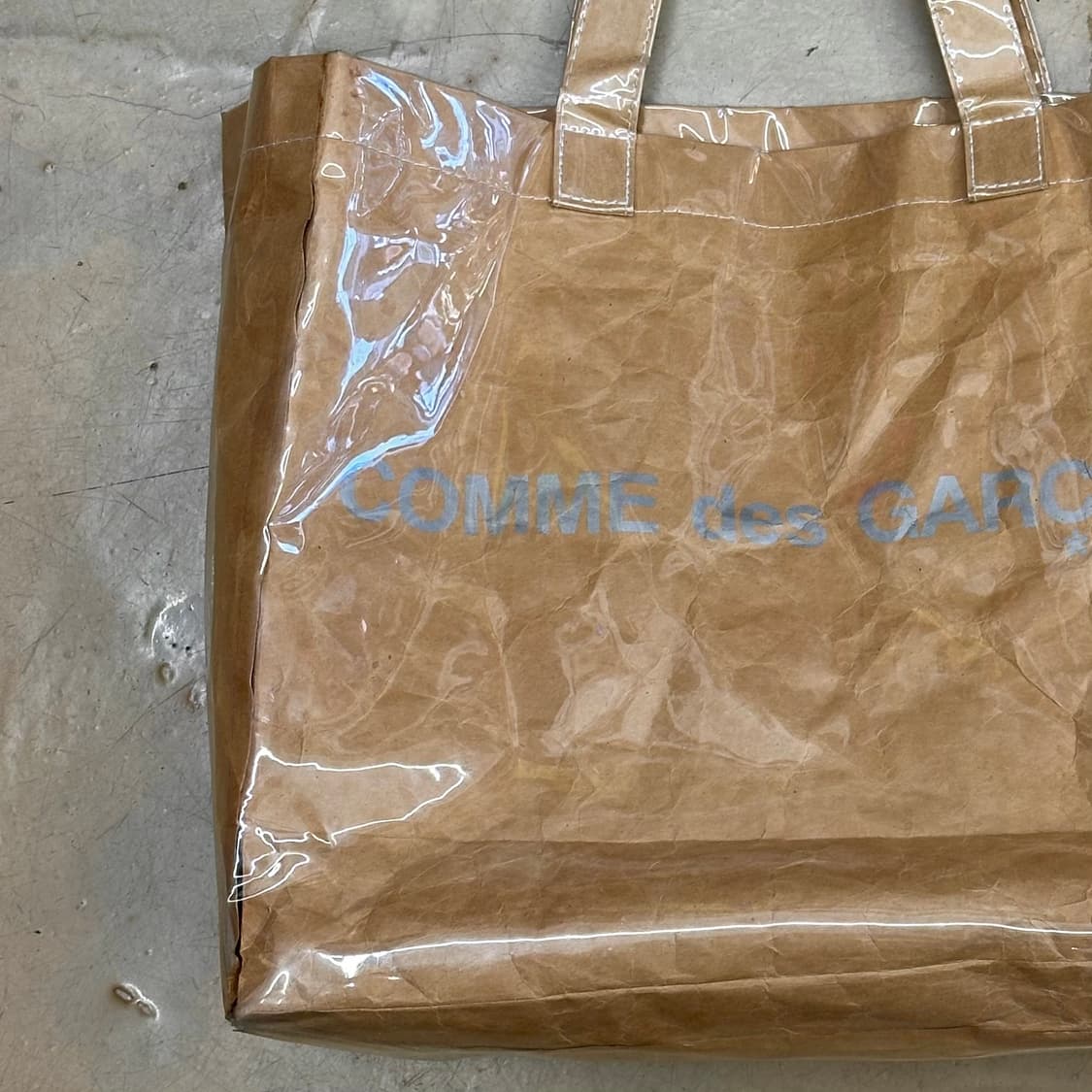 OS 꼼데가르송 PVC 페이퍼 토트백 상품이미지1