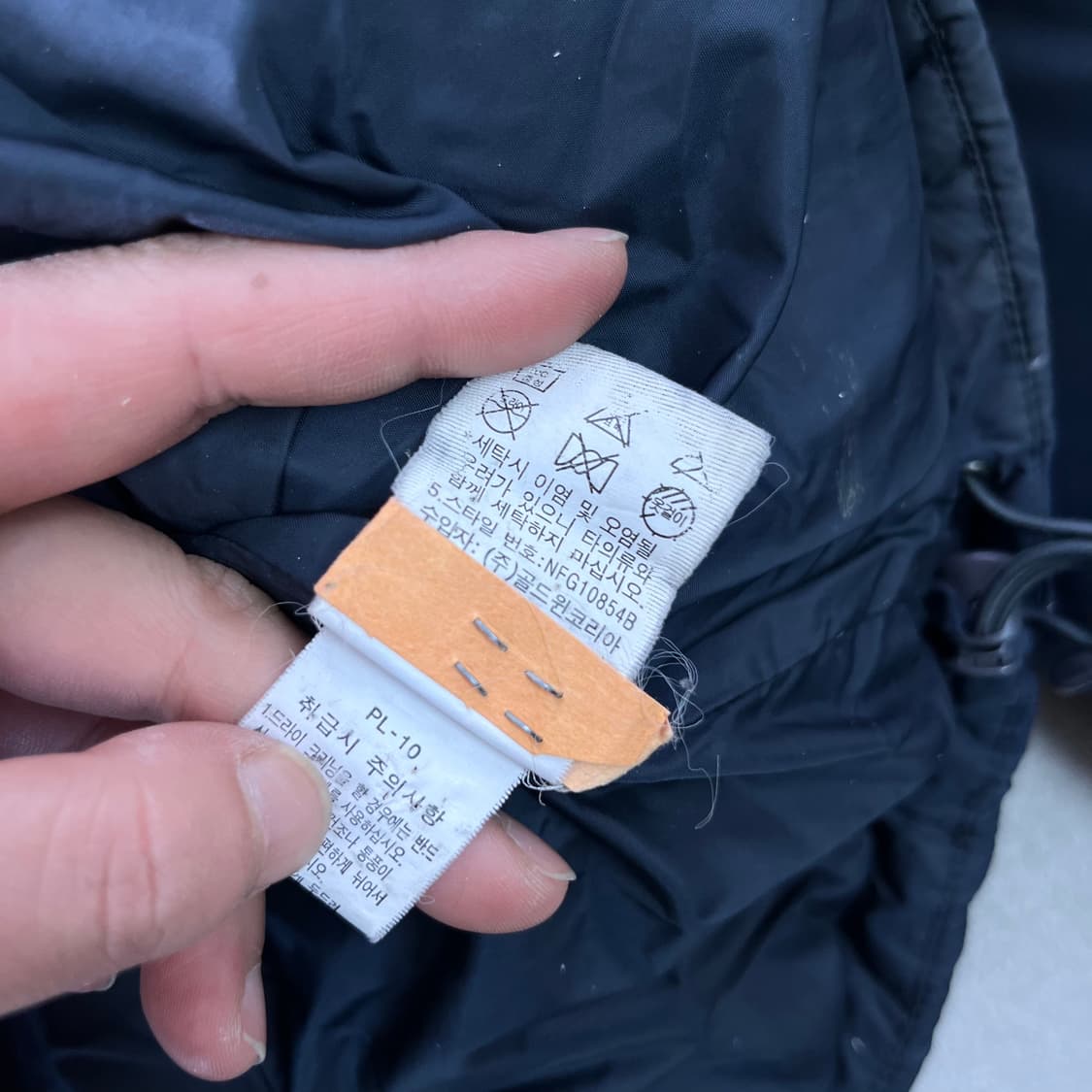 100 노스페이스 550 필파워 구스다운 네이비 경량 패딩 상품이미지7