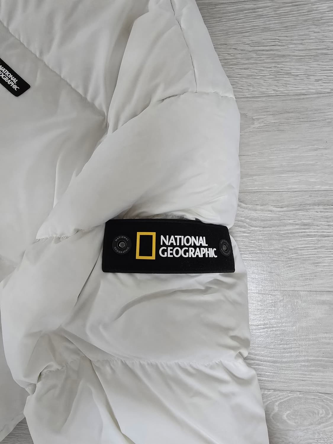 새상품)내셔널지오그래픽 패딩 화이트색상(XL사이즈)팝니다 상품이미지3