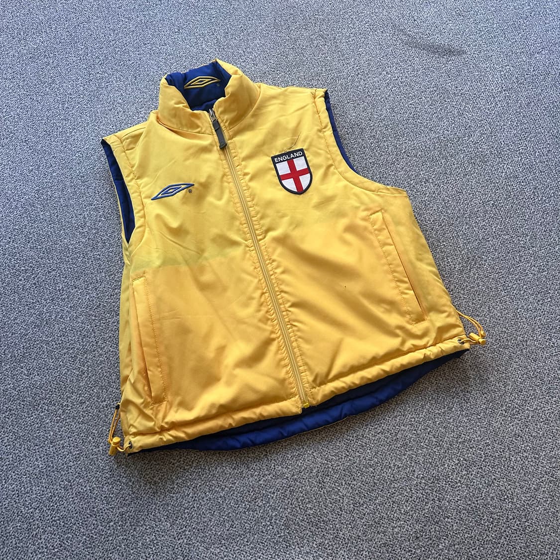 엄브로 옐로우 패딩 조끼 양면 상품이미지1