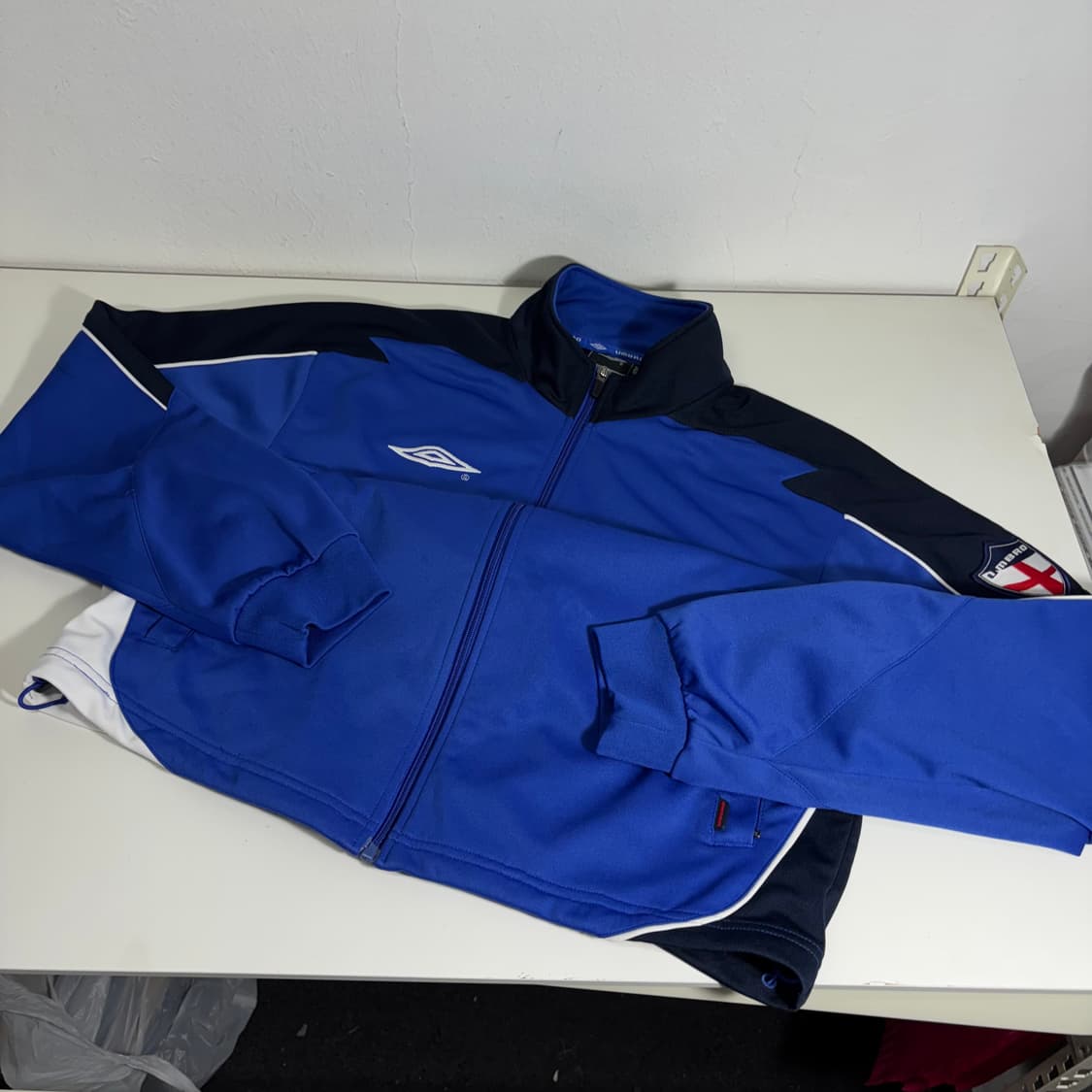 100 L 엄브로 블루 잉글랜드국대 축구트랙탑 집업져지 상품이미지1