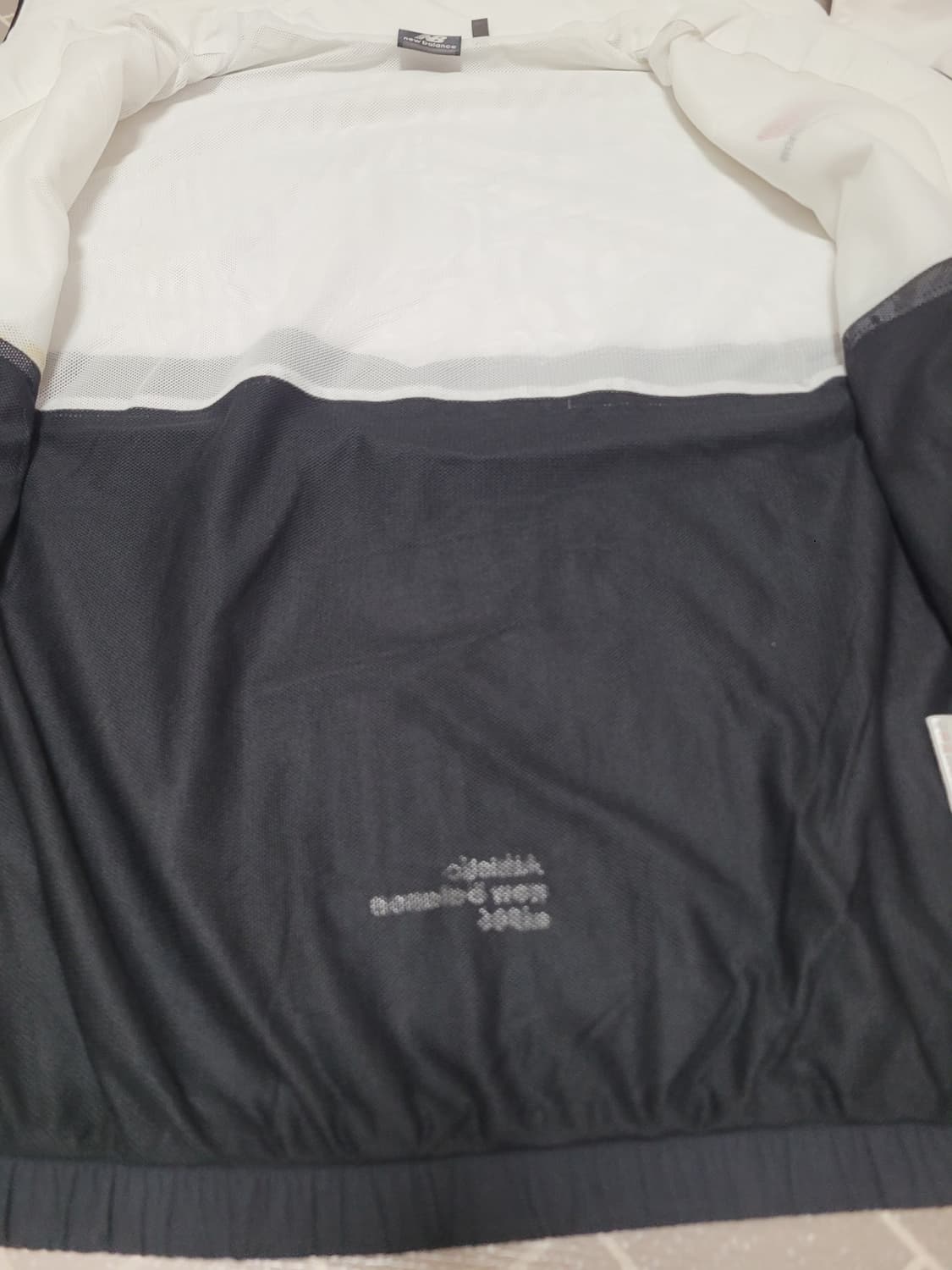 뉴발란스 에센셜 윈드브레이커 집업 자켓 L (100) 상품이미지4