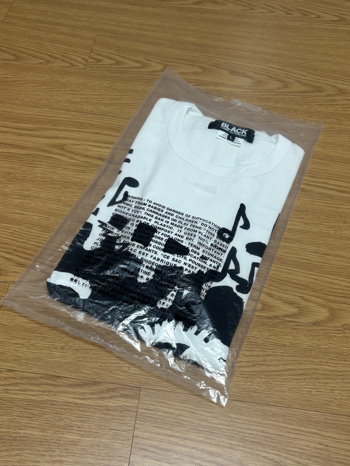 [새상품/L] 꼼데가르송 블랙 프린팅 티셔츠 상품이미지4