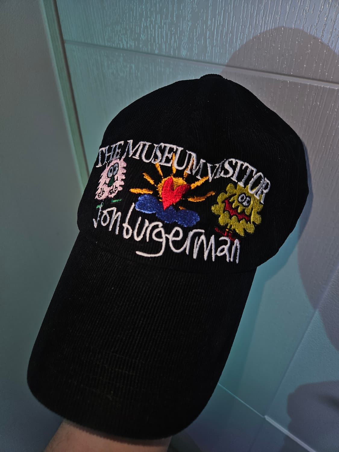 더뮤지엄비지터 존버거맨 모자 상품이미지1