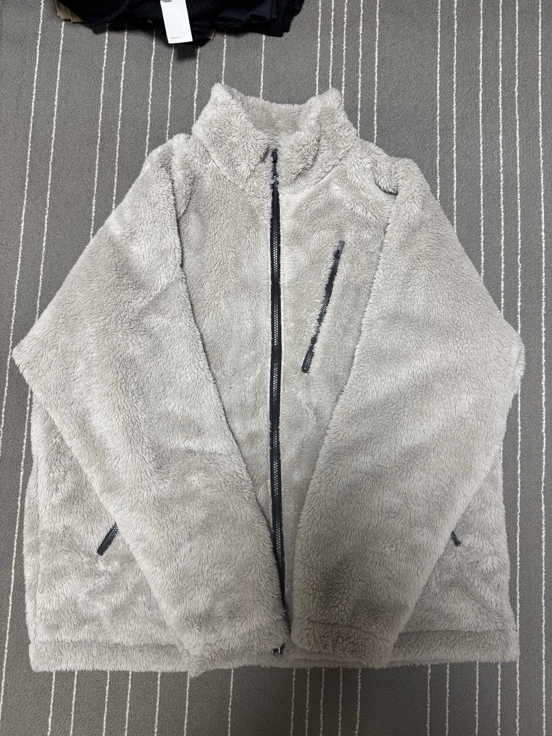 유니들스 베이지 플리스 상품이미지1