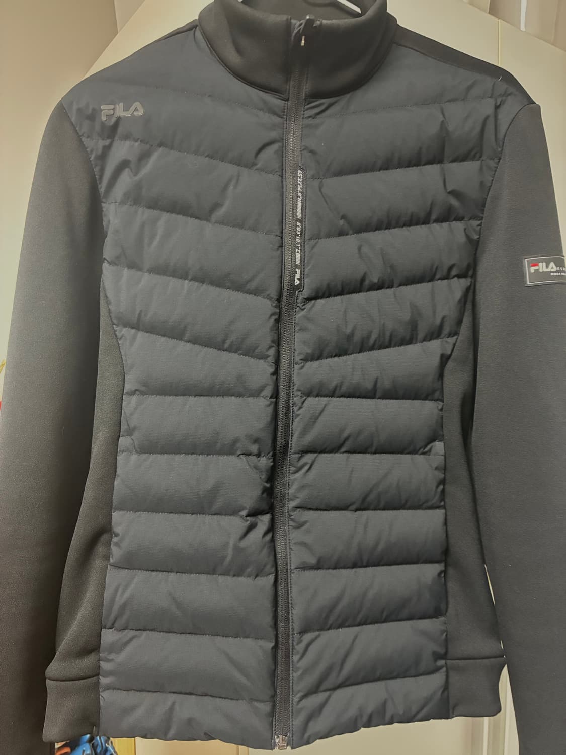 휠라 니트패딩 경량패딩 상품이미지1