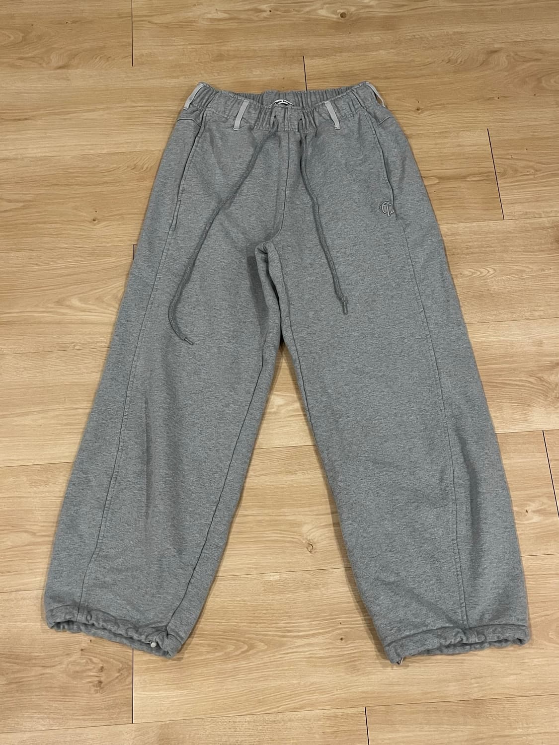 TheOpen Product 더오픈프로덕트 조거팬츠 그레이 상품이미지1