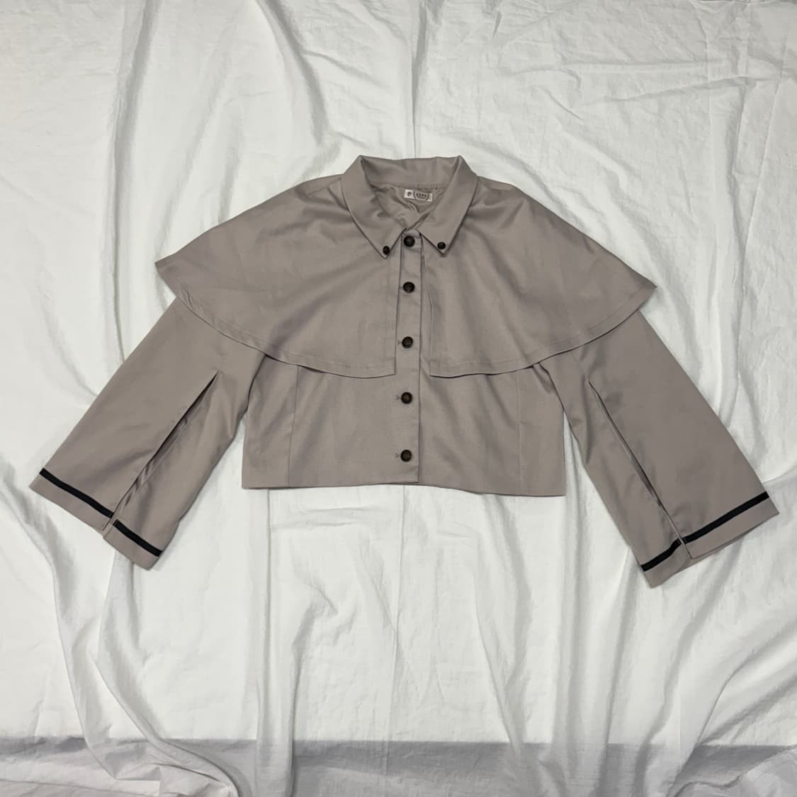 axes femme 밀크티 케이프 상품이미지1