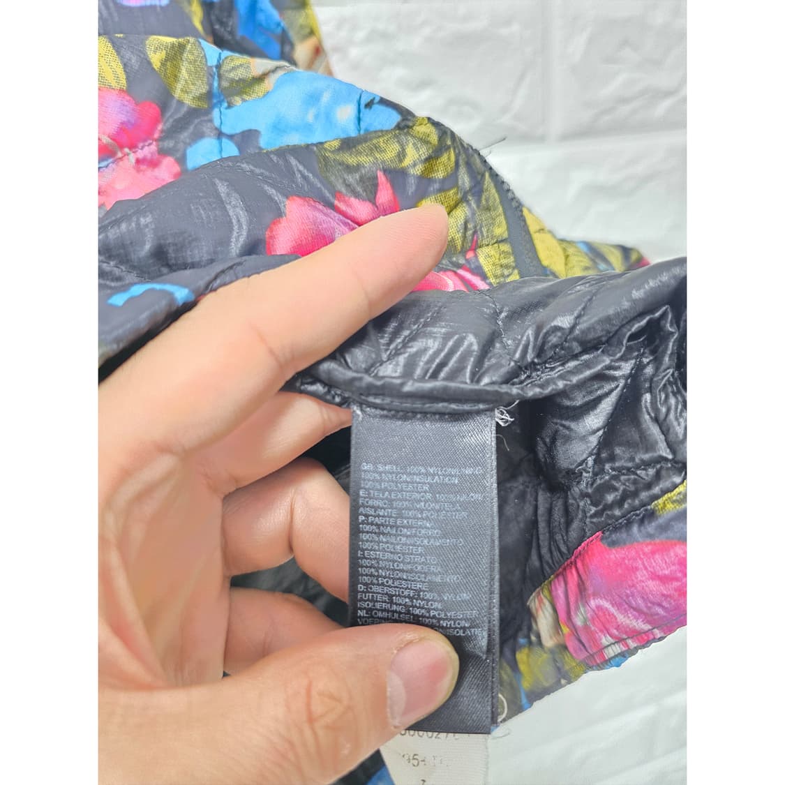 택포) 노스페이스 여성 꽃무늬 경량 패딩 L 상품이미지3