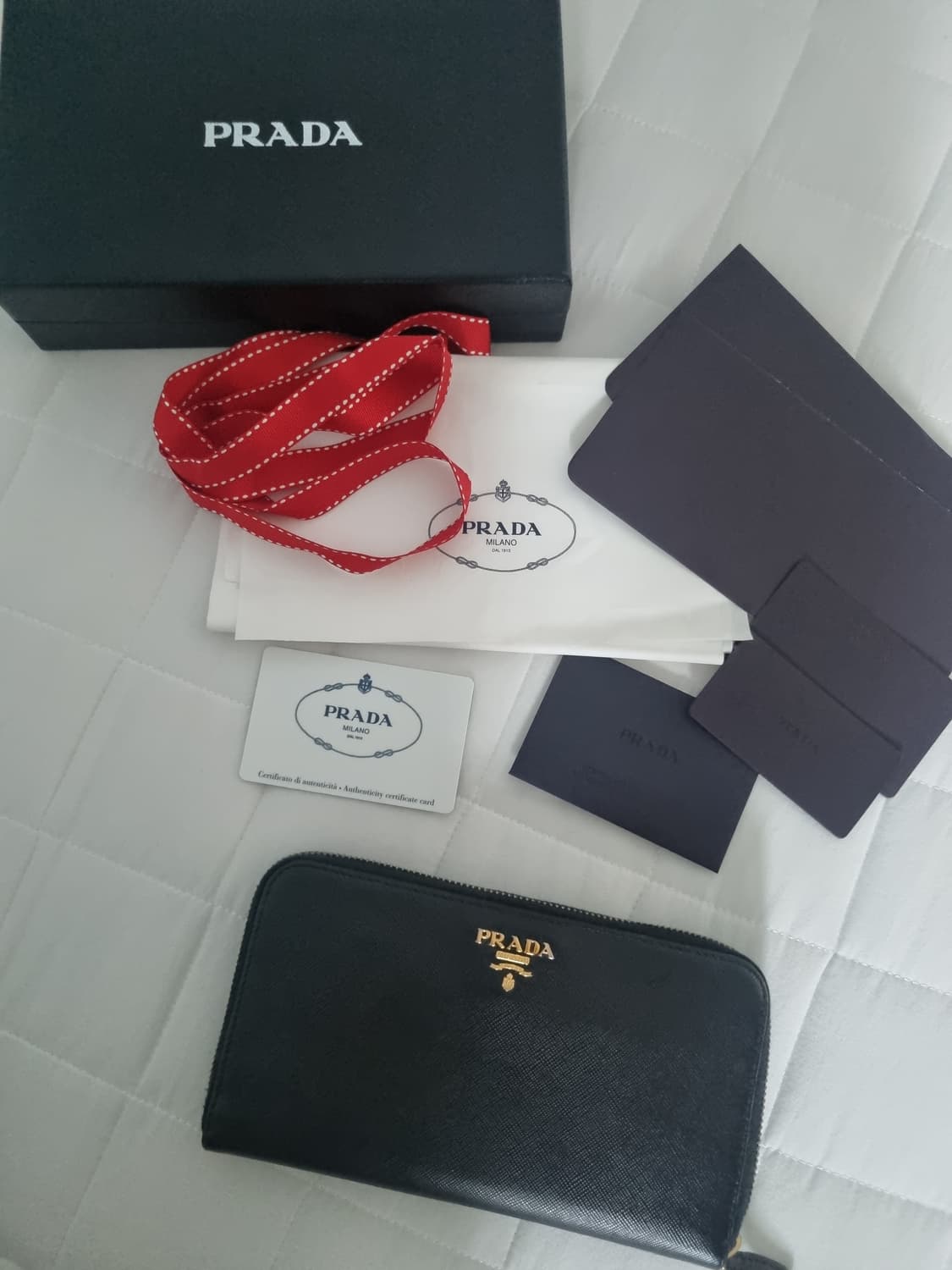 [ 풀구성품 ] 프라다 사피아노 금장 지퍼돌이 장지갑 상품이미지1