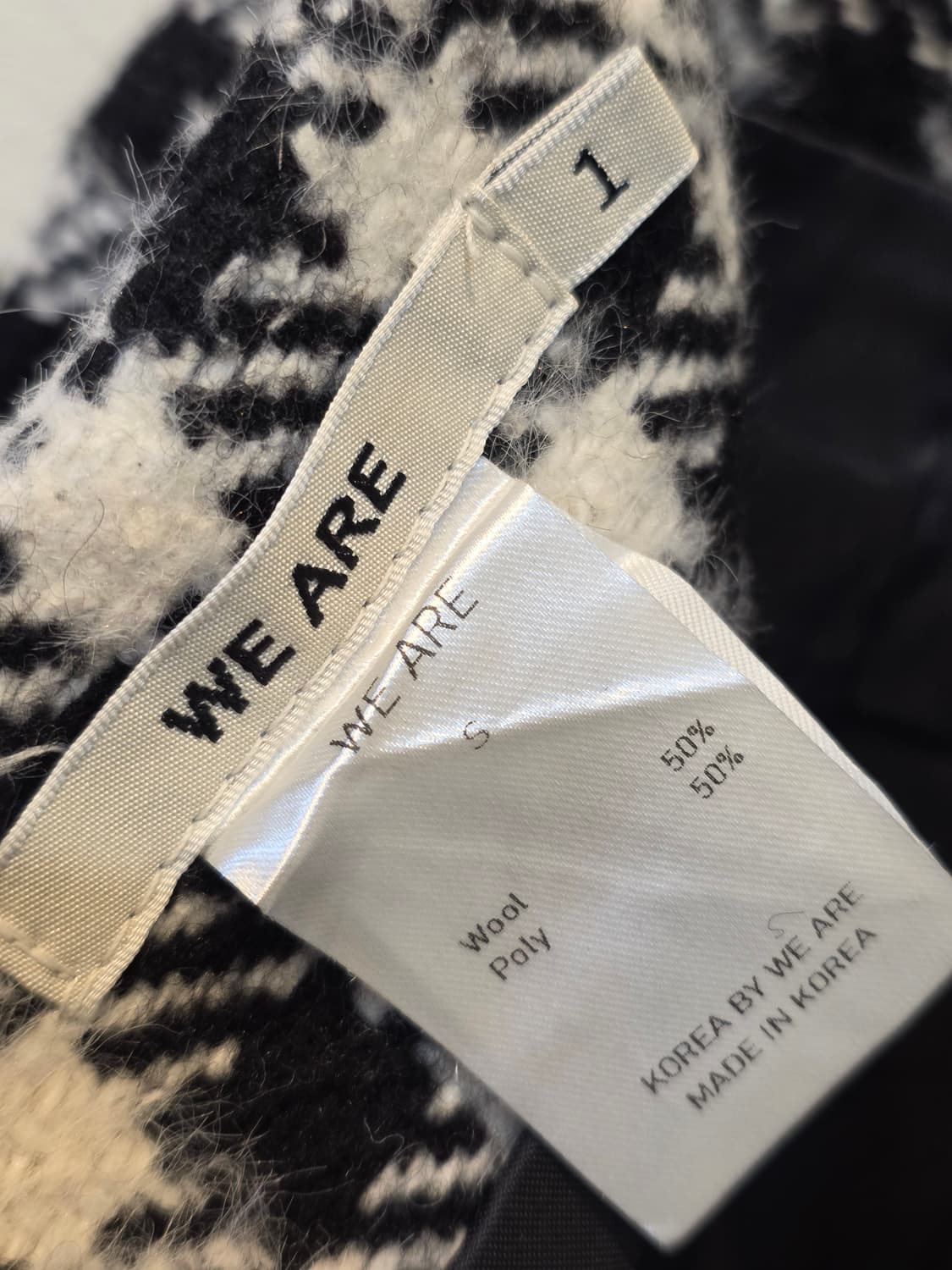 위아  블랙 하운드투스 체크패턴 울혼방스커트 상품이미지6