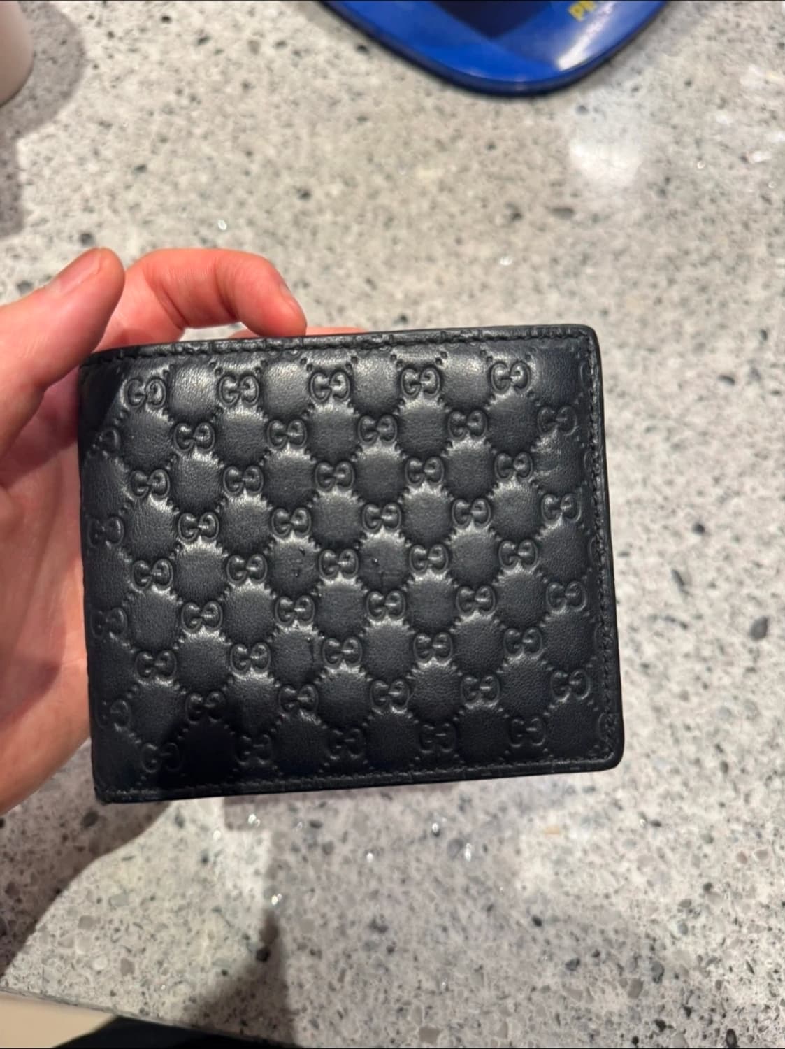 구찌 GG 엠보 반지갑 블랙 상품이미지1