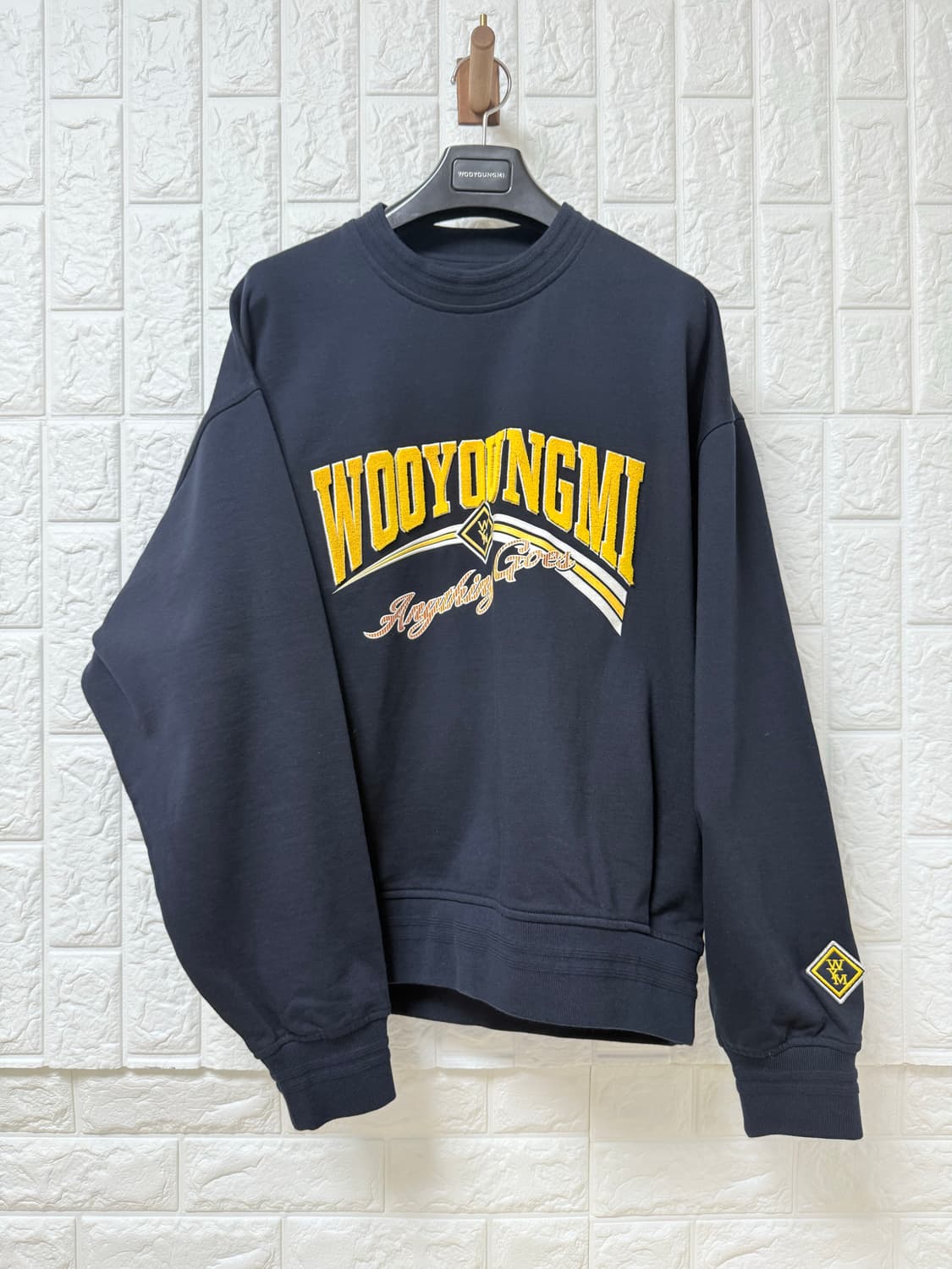(25FW새상품)우영미 네이비 렌티큘러 로고 스웨트셔츠(46) 상품이미지1