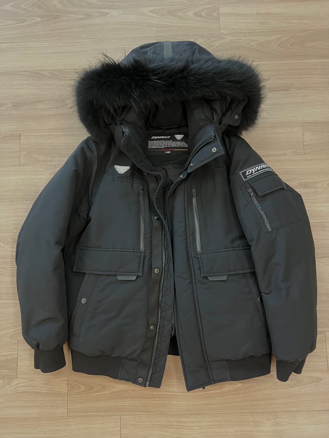 다이나핏 블랙 다운 패딩 상품이미지1