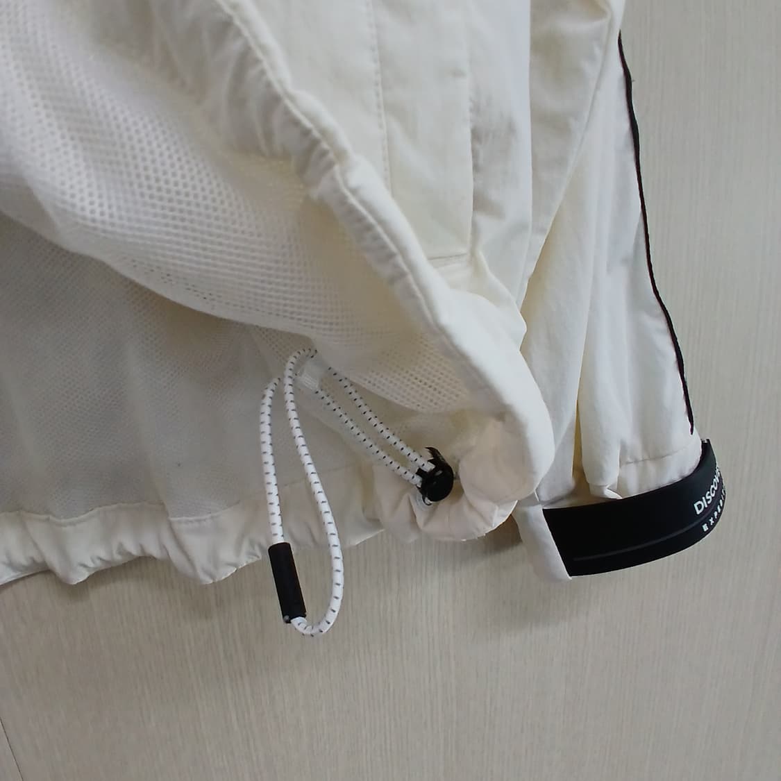 디스커버리 흰색 후드 바람막이 점퍼 상품이미지7