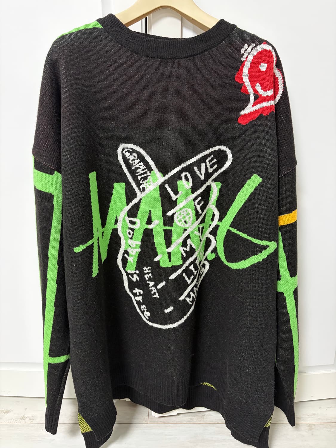 그라피스트 만지 MAN.G 그래픽 오버핏 니트 블랙 상품이미지1