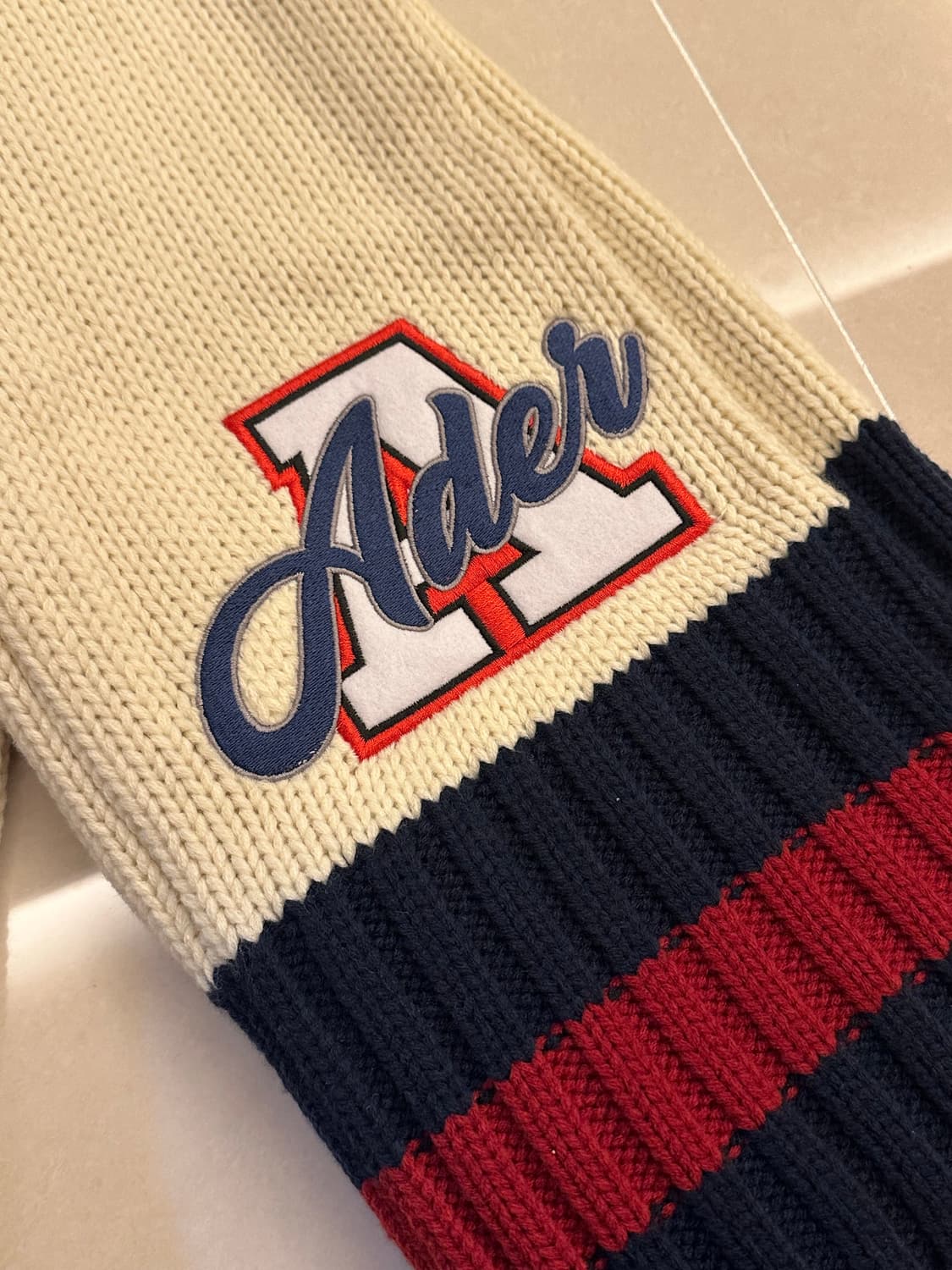 아더에러 머플러 상품이미지1