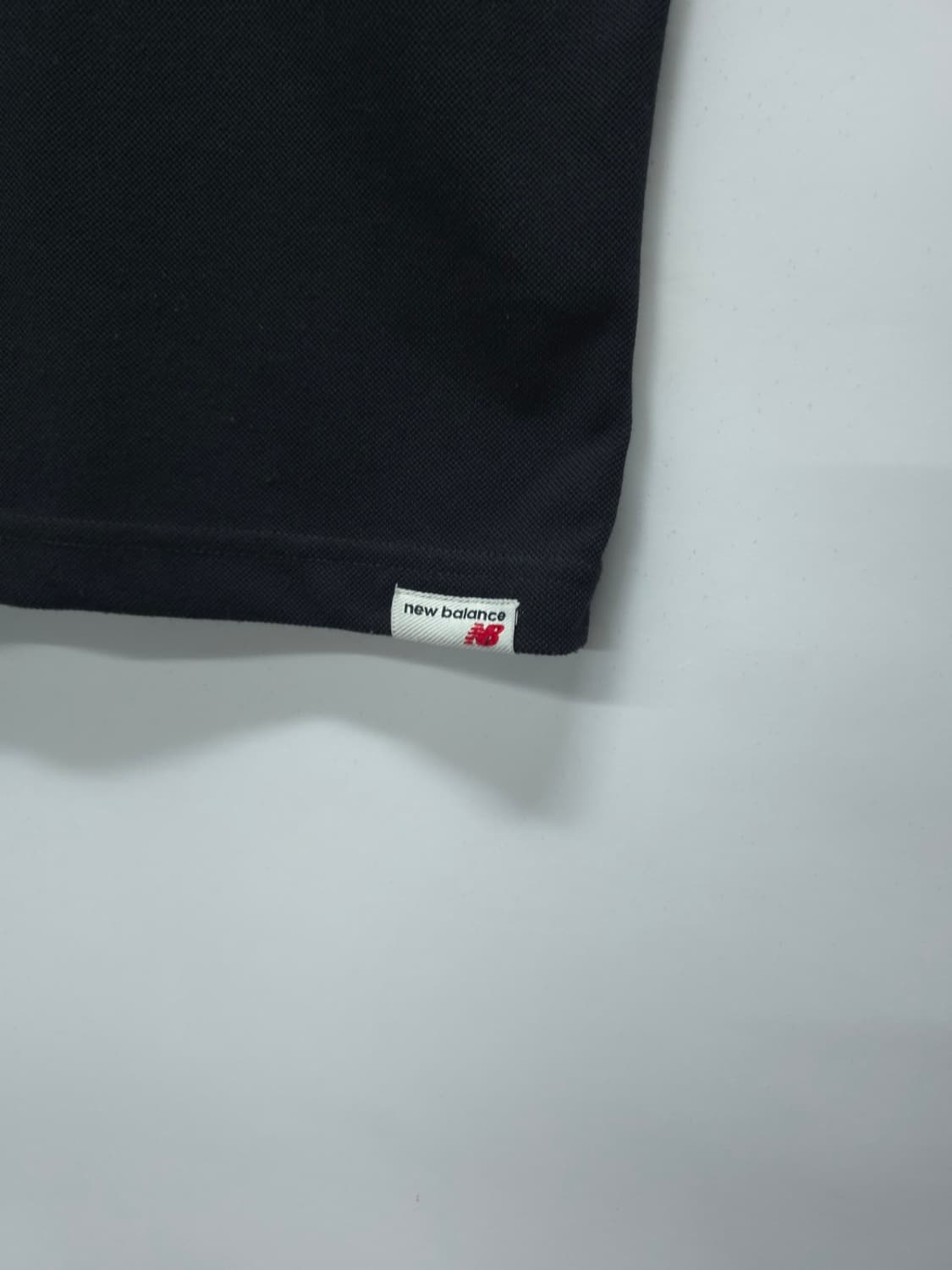 뉴발란스 여성 가슴 자수 로고 반팔 카라티 블랙(66) 상품이미지9