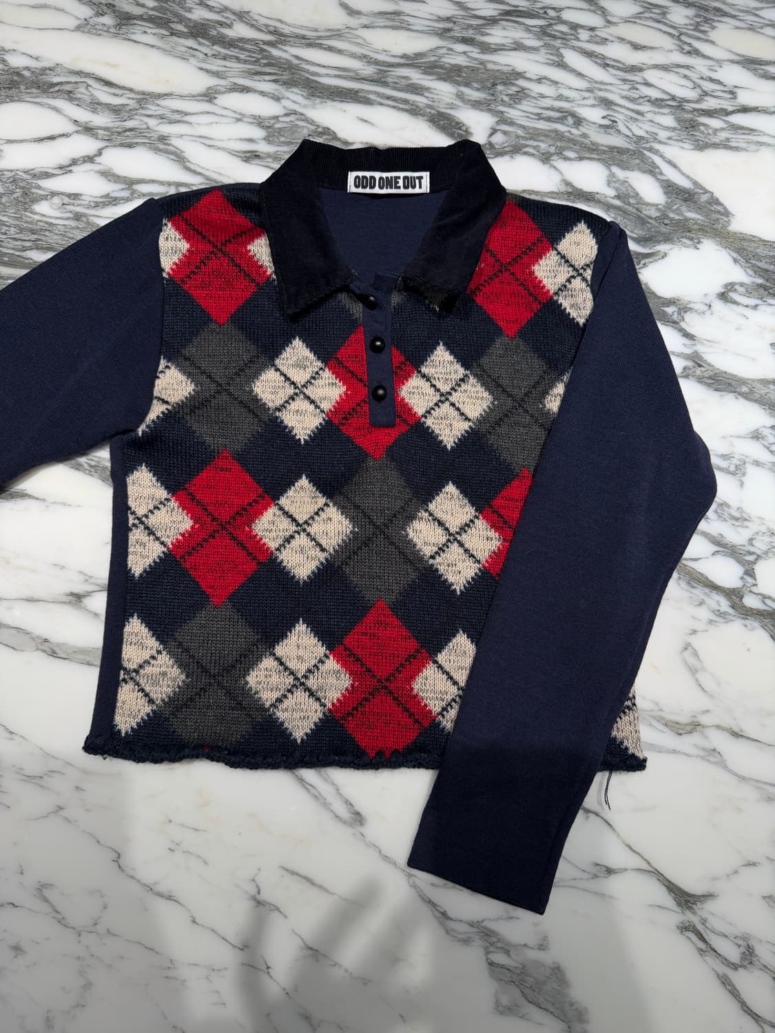 오드원아웃 깅엄체크 니트 상품이미지1