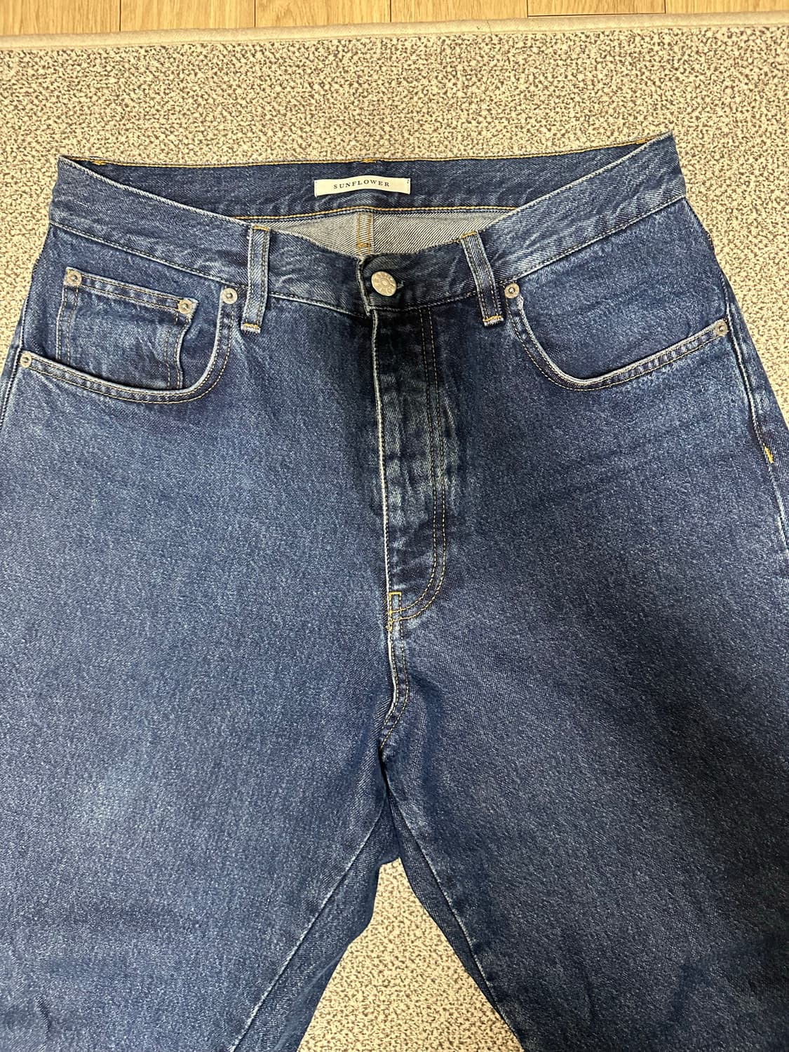 선플라워 와이드 트위스트 데님 팬츠 (린스 블루 32 size) 상품이미지1