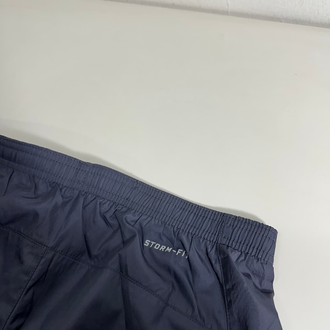 우먼M-L 나이키 다크네이비 레귤러핏 바람막이 팬츠 상품이미지8