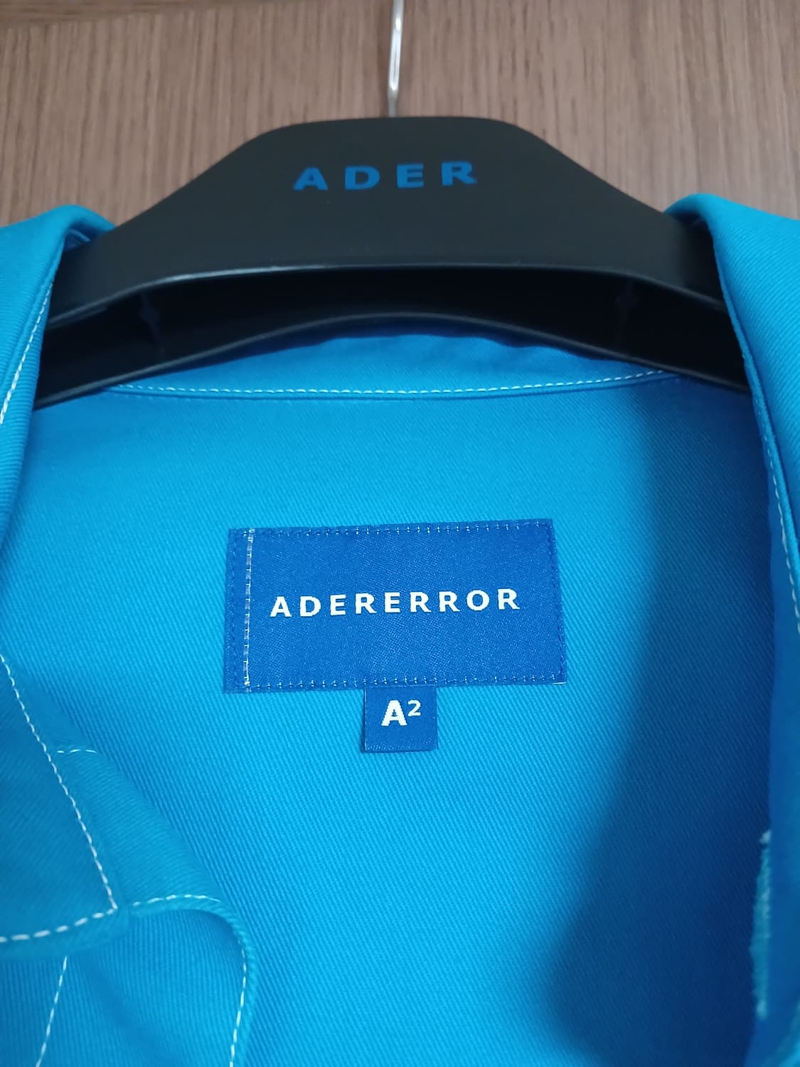 아더에러 블루 셔츠 a2 상품이미지1