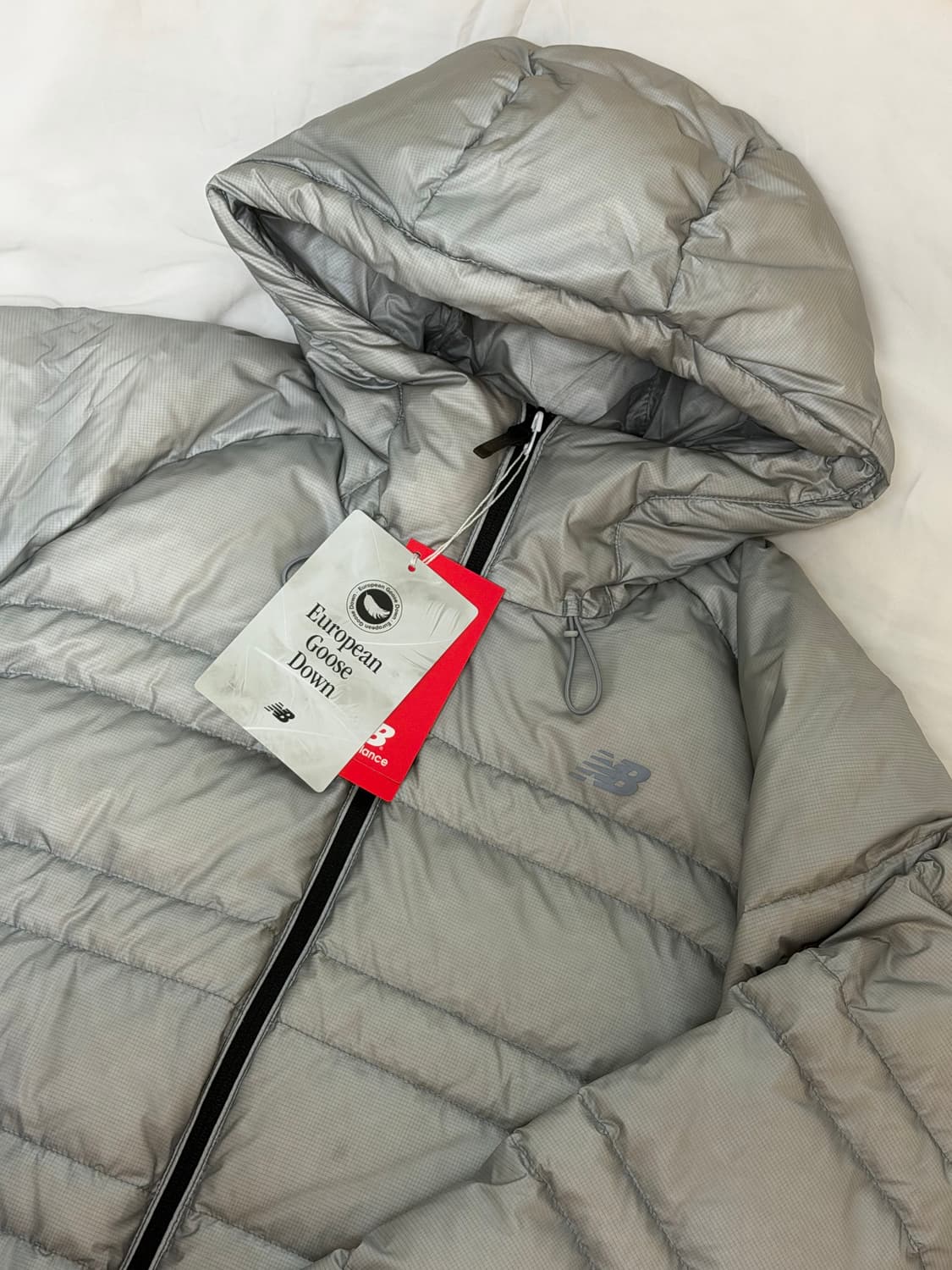 [남녀공용] 뉴발란스 플라잉77 슈퍼라이트 구스다운 S 상품이미지6