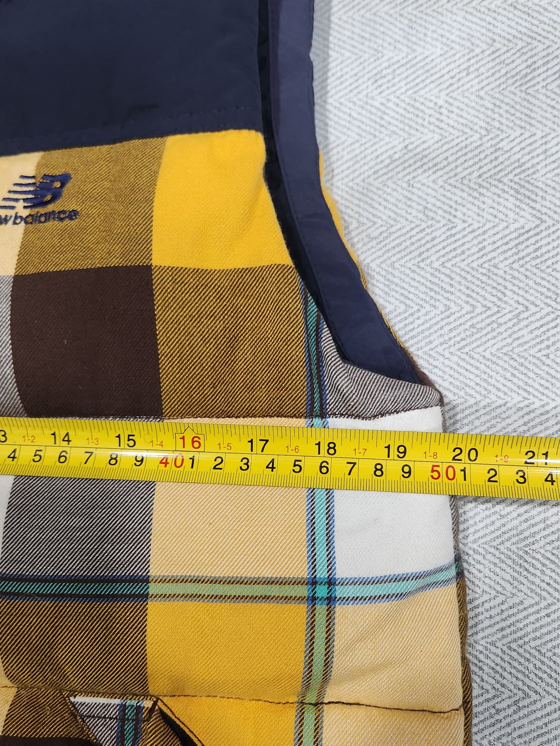 뉴발란스 체크 패턴 덕다운 패딩 조끼 남녀공용 90(M)사이즈 상품이미지9