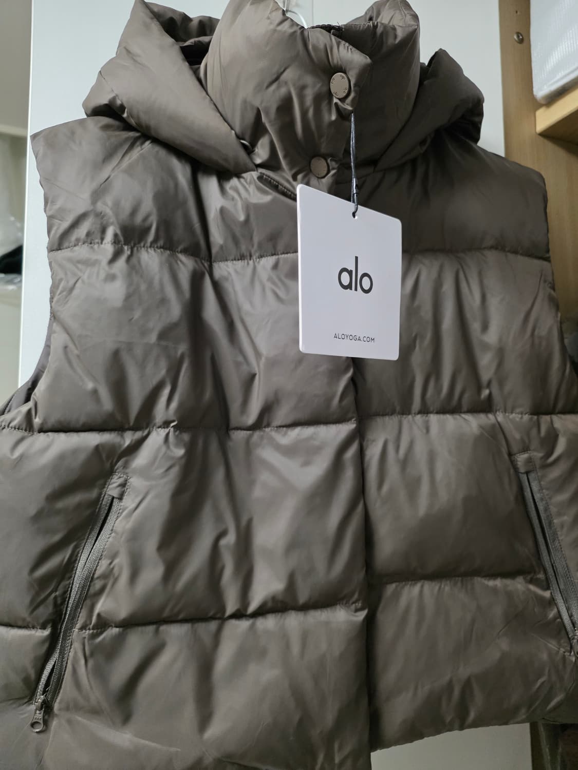 알로 브라운 패딩 조끼 상품이미지1