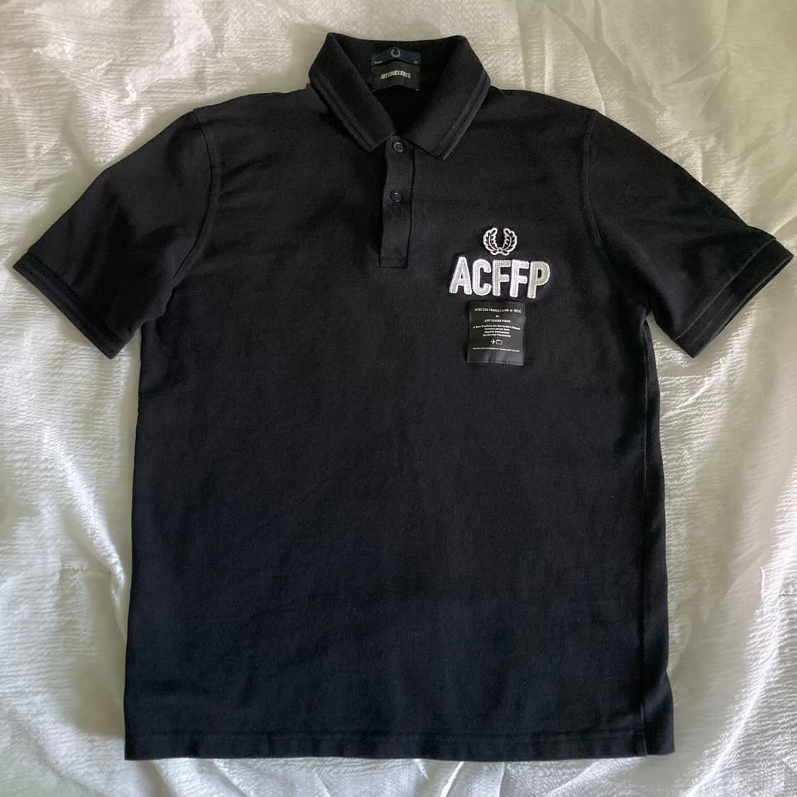 프레드페리 X ACF 레터링 폴로셔츠 상품이미지1
