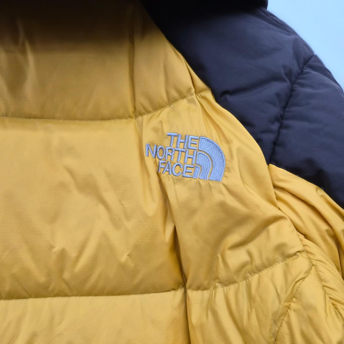 노스페이스 700 구스다운 옐로우/브라운 배색 눕시 패딩 남녀공용 M 상품이미지10