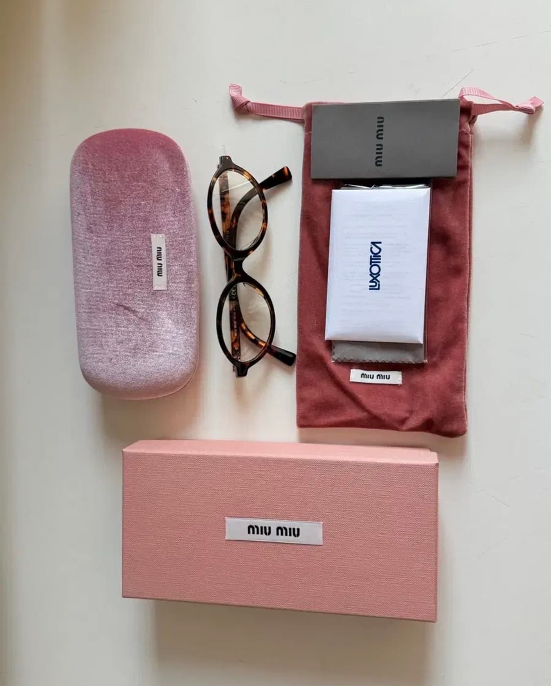 미우미우 안경 상품이미지1