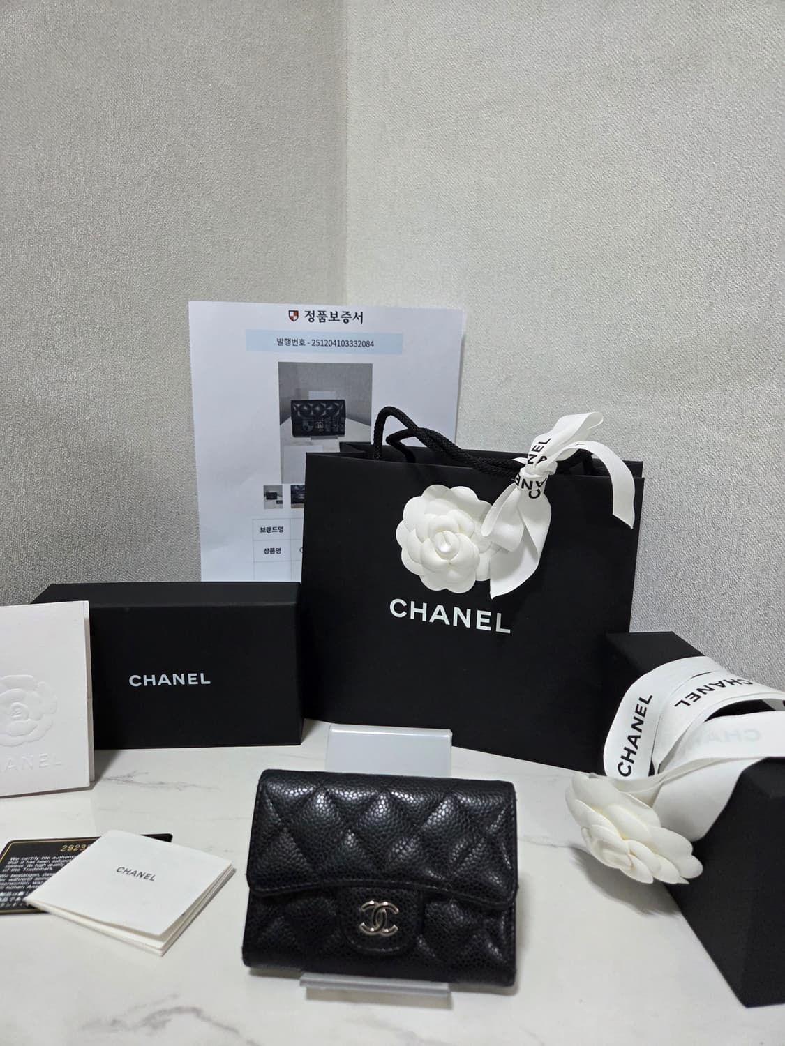 [새상품급] 샤넬 클래식 캐비어 똑딱이 은장 플랩 지갑 상품이미지1