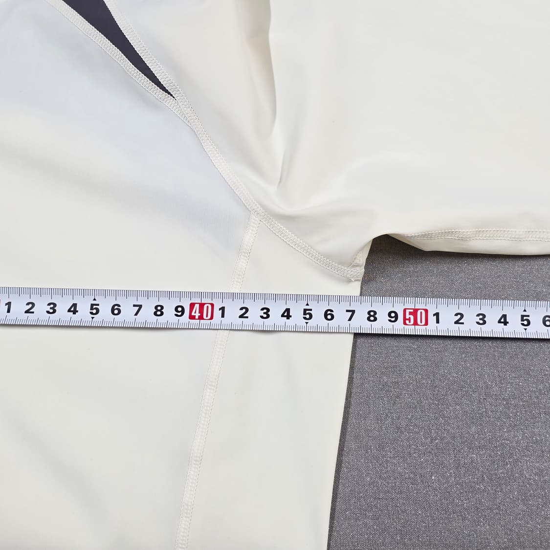 95) 데상트 후드 경량 스판 바람막이 아이보리 상품이미지6