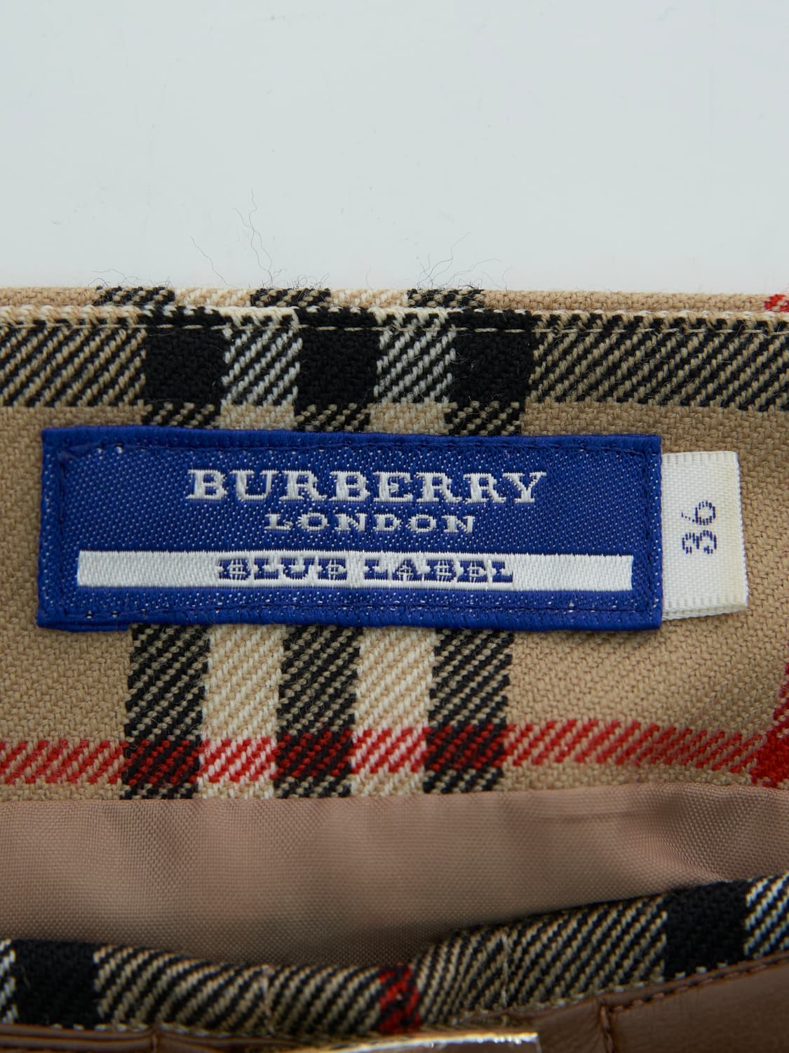 Burberry 블루라벨 노바체크 금장 미디 스커트 상품이미지5