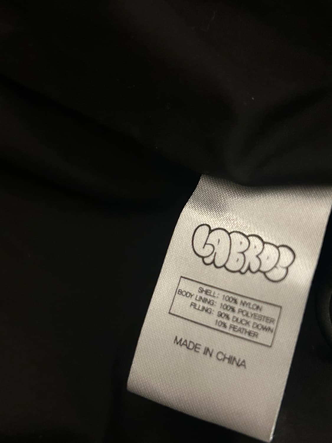 라브로스 웨이브 패딩oval logo wavy padded jacket 상품이미지5