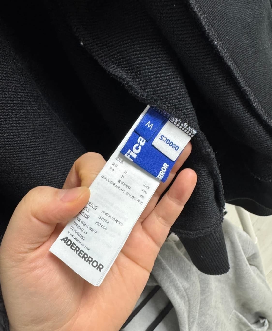 아더에러 시그니피컨트 TRS/BL 태그 후드 집업 01 블랙 상품이미지2