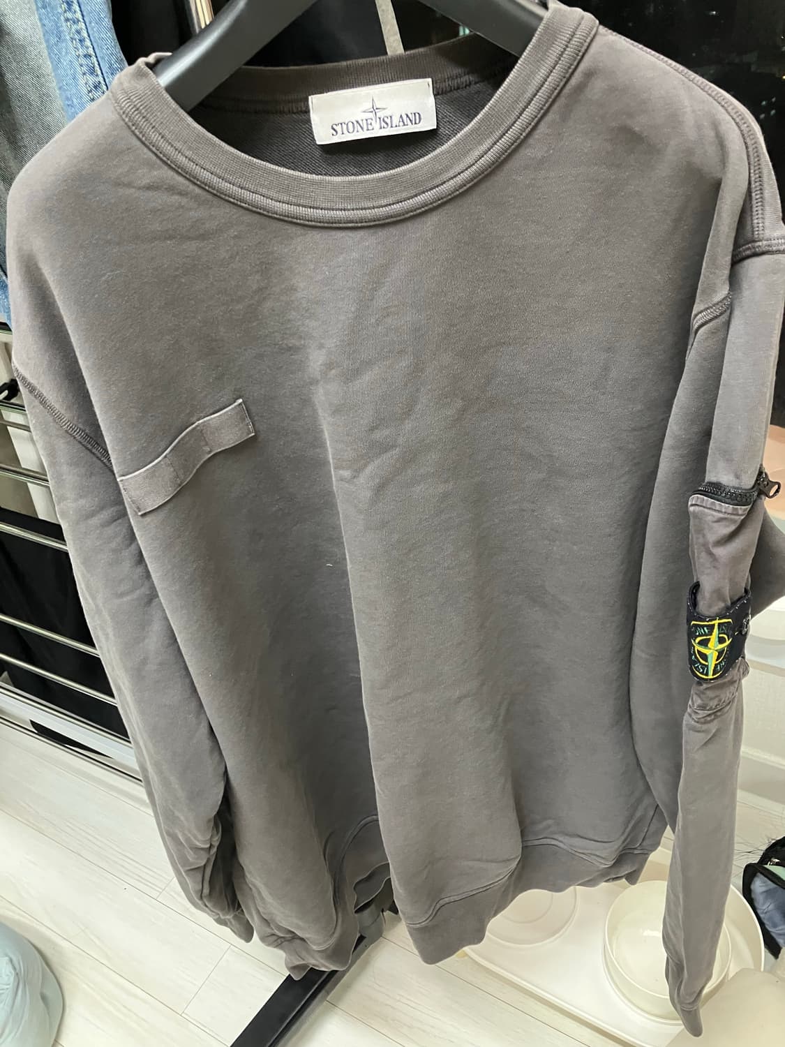 스톤아일랜드 포켓 슬리브 상품이미지1