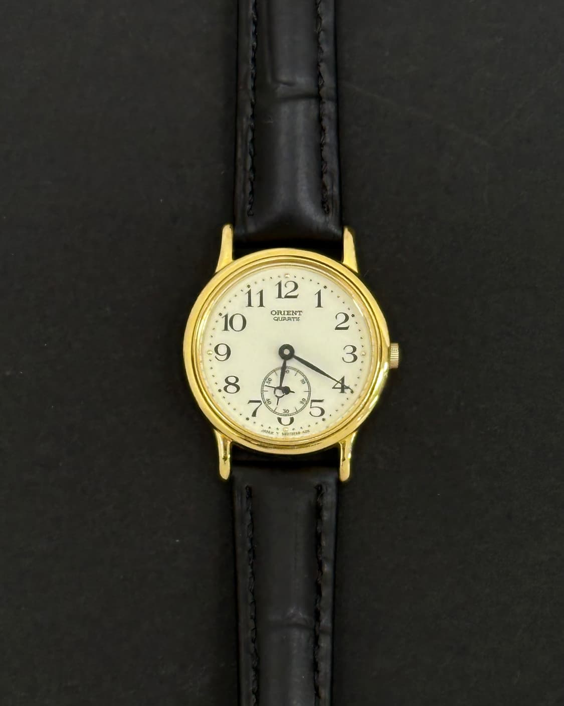 오리엔트 스몰세컨즈 라운드 쿼츠 시계 상품이미지1