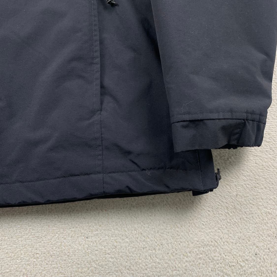 칼하트 WIP 님버스 풀오버 아노락 자켓 블랙 상품이미지5