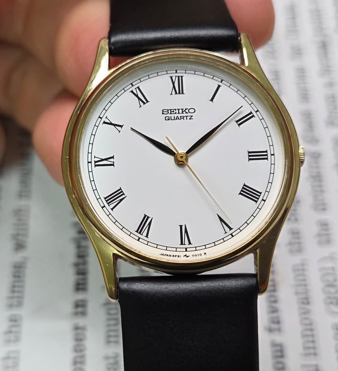 빈티지 세이코 순정 화이트 로만판 리프핸즈 울트라슬림 쿼츠
 상품이미지1