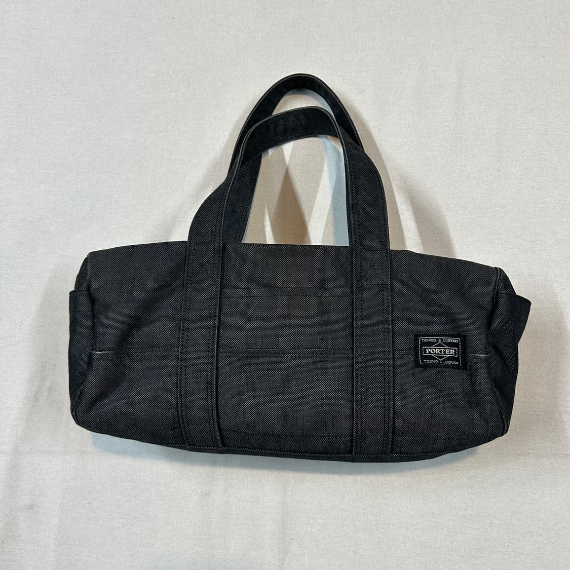 요시다 포터 스모키 더플백 보스턴백 원통형 가방 상품이미지1