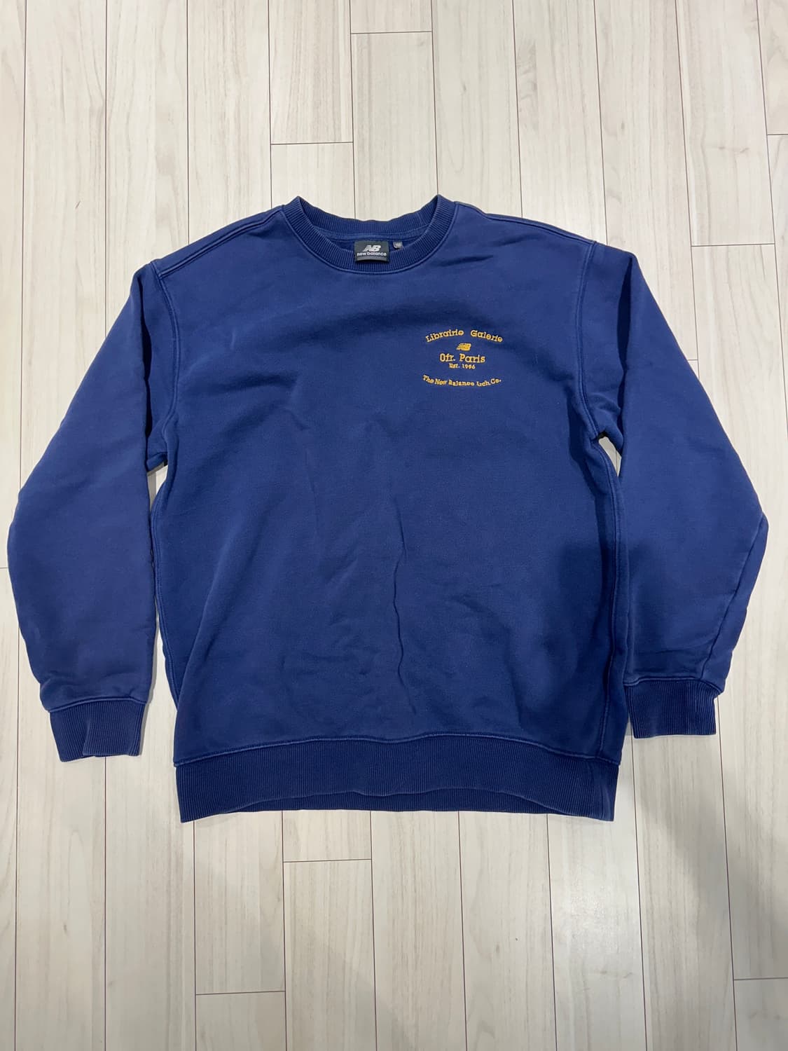 뉴발란스 네이비 맨투맨 100 상품이미지1