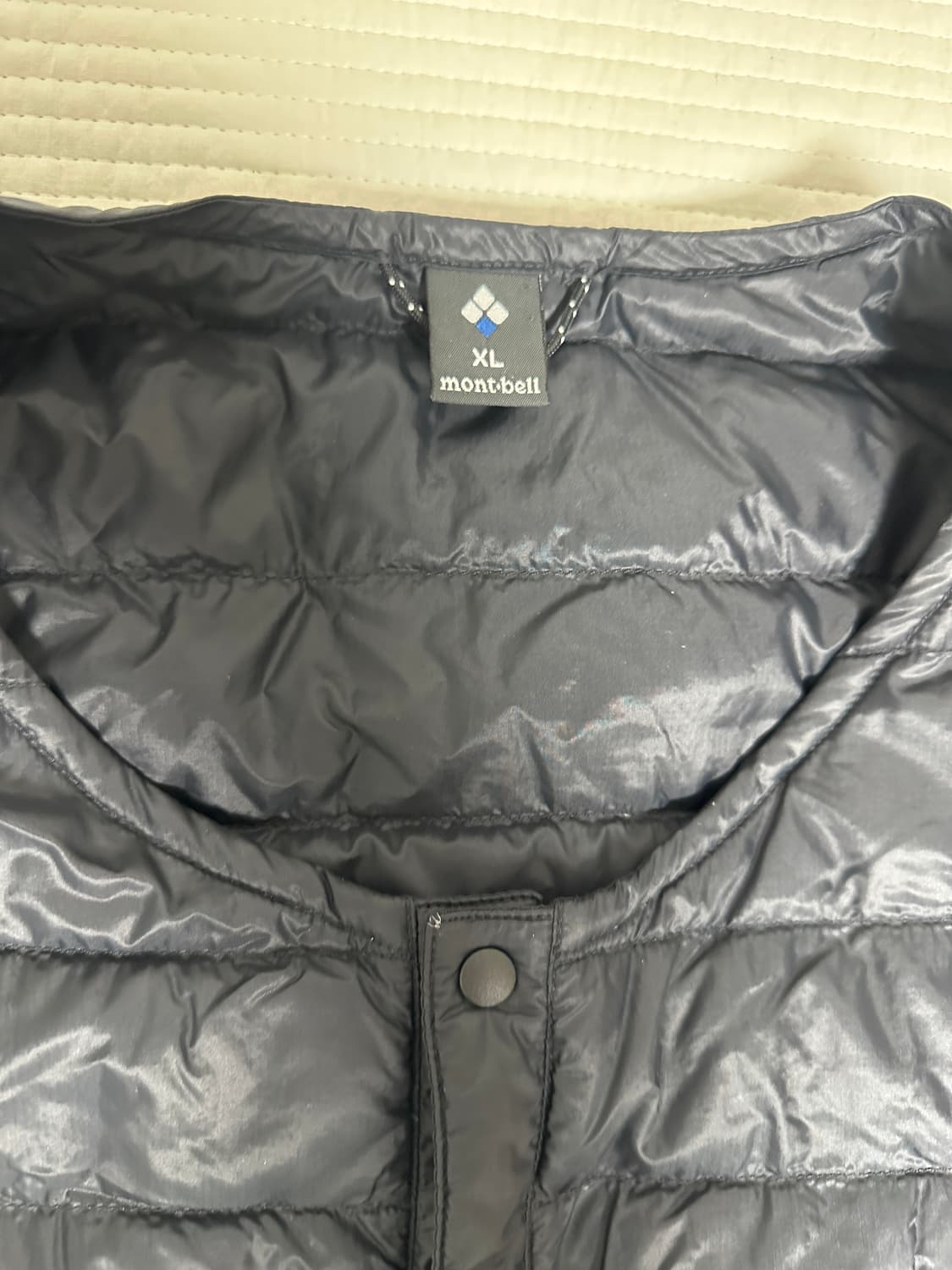몽벨 슈페리어 반팔패딩 XL 판매합니다. 상품이미지2