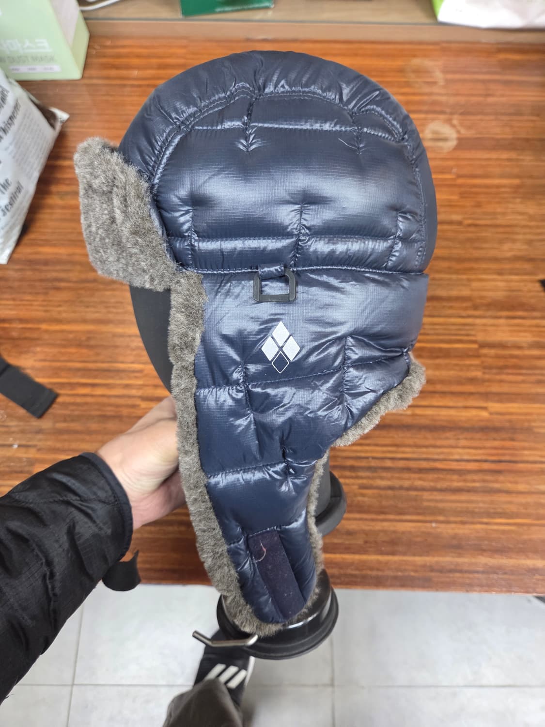 몽벨 구스다운 트루퍼 귀달이 플리스 패딩모자 m 상품이미지2