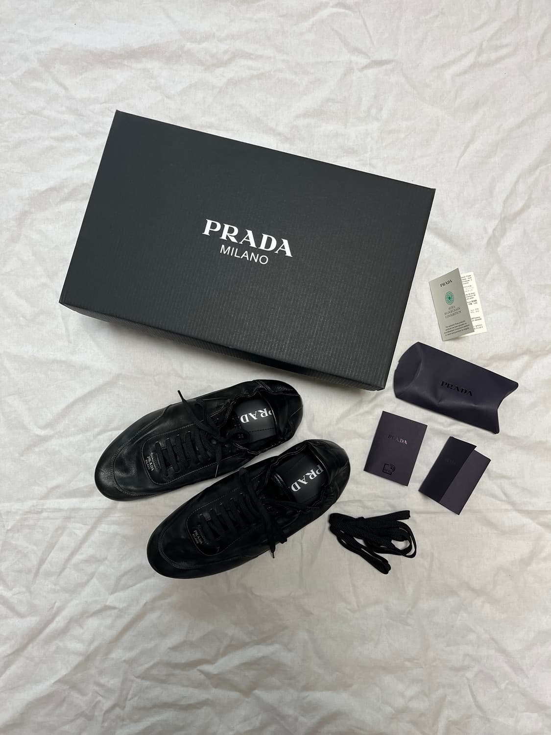 프라다(PRADA) 컬랩스 레더 스니커즈 상품이미지1