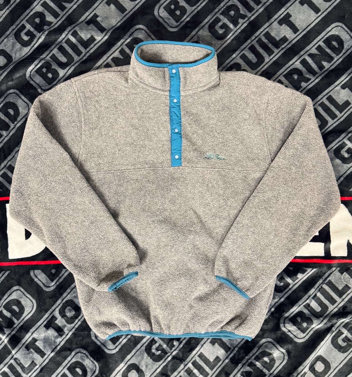 엘엘빈 스냅 티 플리스 풀 오버 그레이 앤 틸 상품이미지1