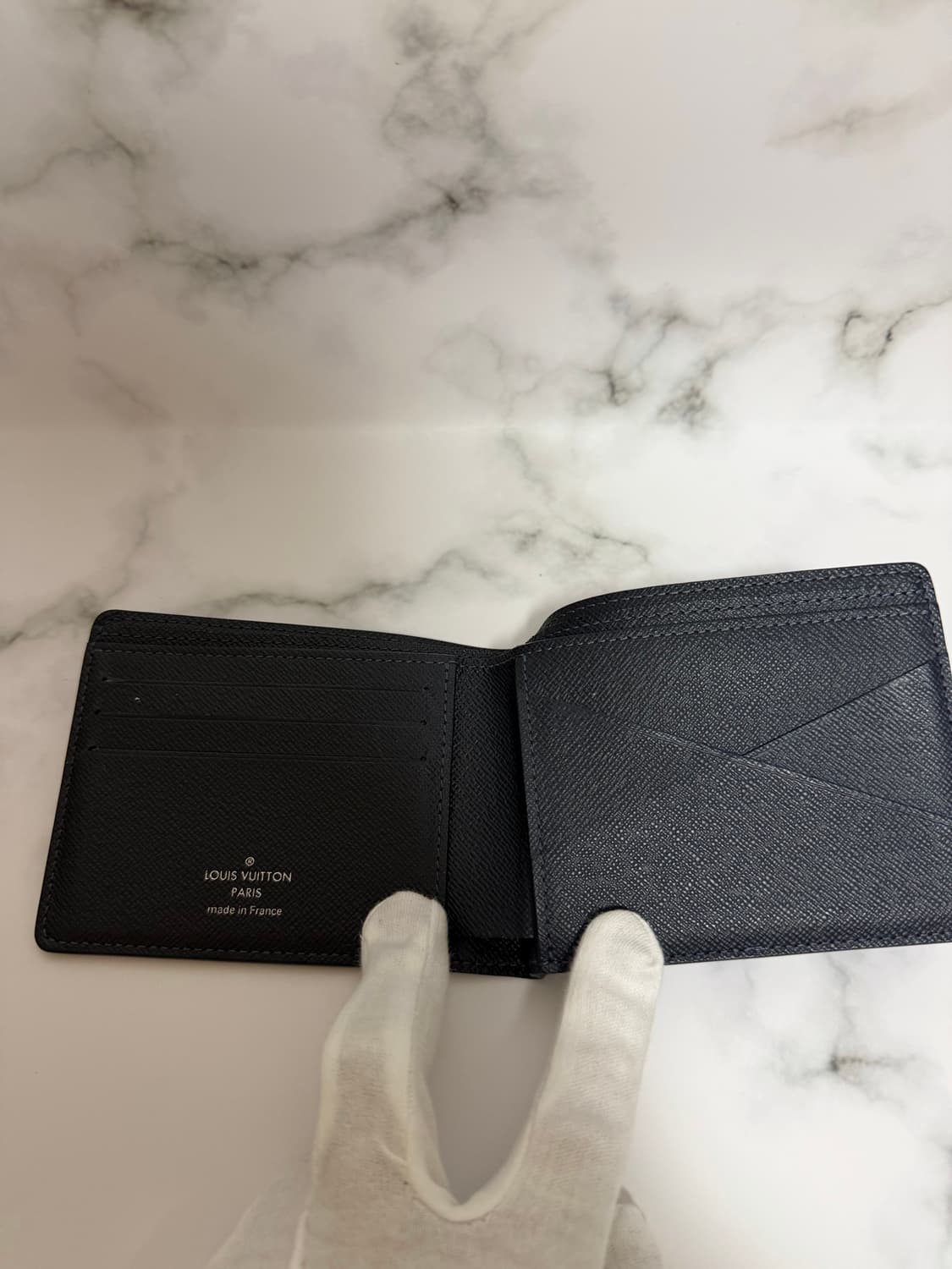 루이비통 멀티플 월릿 타이가 반지갑 상품이미지2