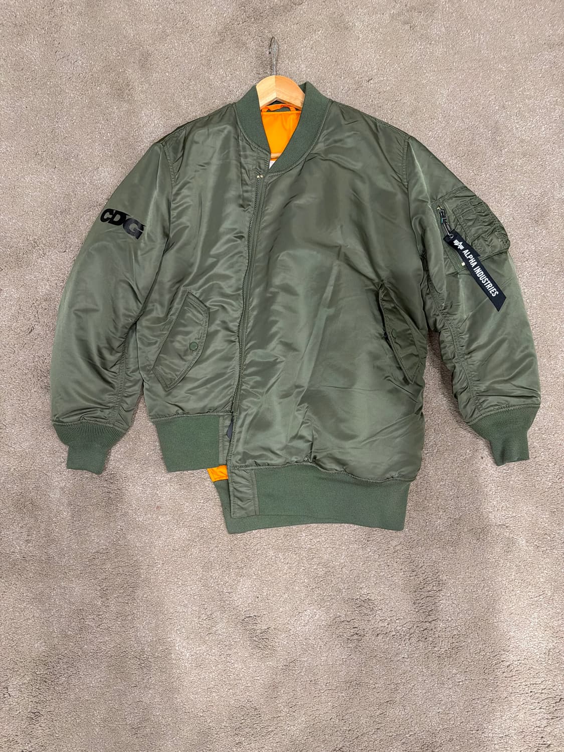 CDG x ALPHA INDUSTRIES MA1 (카키색 Large) 상품이미지1